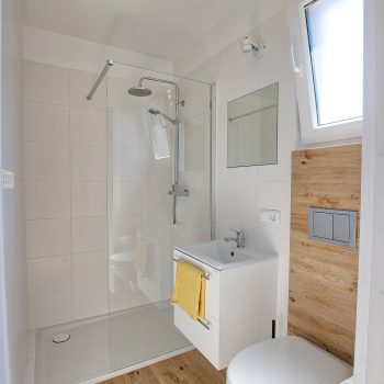 DOMKI POD SOSNAMI SŁAWA